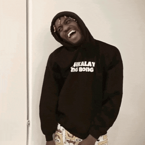 a man wearing a black hoodie that says ' akalay ng bong '
