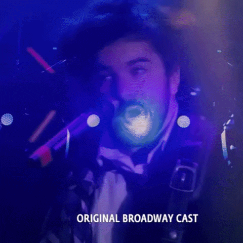 a man in a tuxedo and tie with the words original broadway cast above him