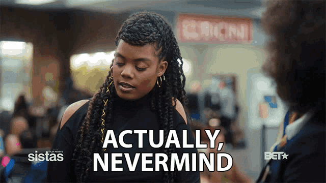 a woman says actually nevermind while standing in front of a store