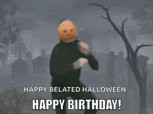 a man in a halloween costume with a pumpkin on his head is running in a cemetery .