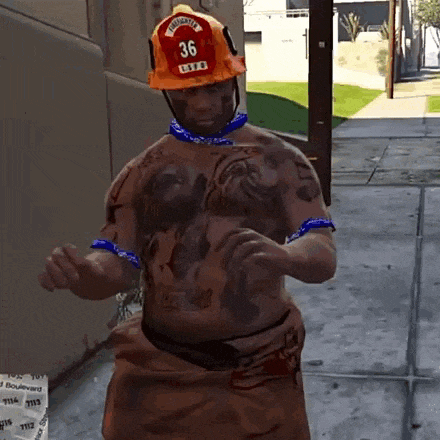 a shirtless man wearing a fireman 's helmet with the number 36 written on it