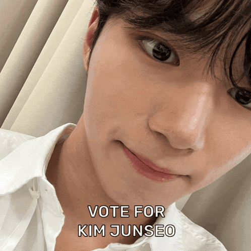 a close up of a man 's face with the words " vote for kim junseo " below it