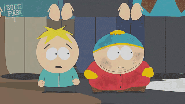 two south park characters standing next to each other in front of a sign that says south park