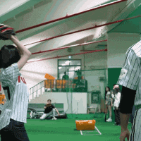 a baseball player with the number 10 on his back