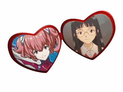 a pair of heart shaped glasses with a picture of two anime girls on them