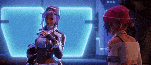 a couple of women are standing next to each other in a room with neon lights .