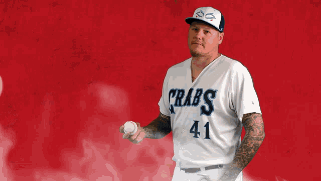 a baseball player wearing a crabs 41 jersey
