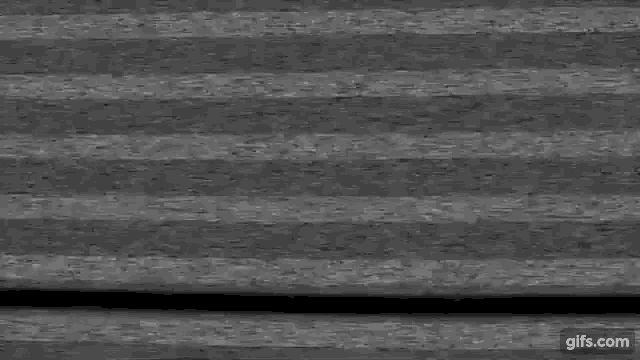 a black and white image of a tv screen with a static noise .