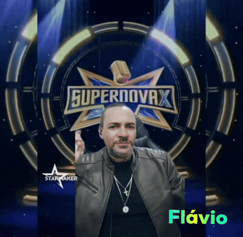 a man stands in front of a supernovax sign