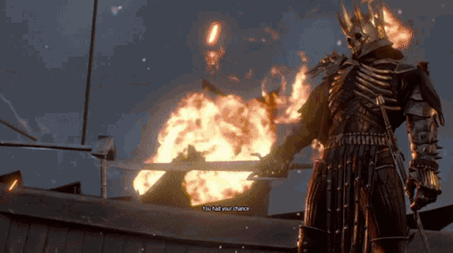 a video game character is standing in front of a fire and says you had your chance