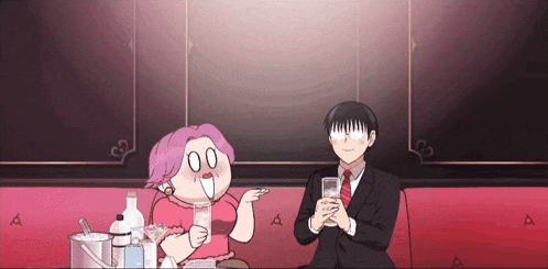 a man and a woman are sitting on a couch with drinks