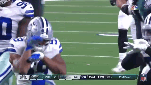 a football game between the dallas cowboys and the philadelphia eagles is underway