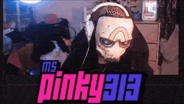 a person wearing headphones and a mask with pinky313 written on the bottom