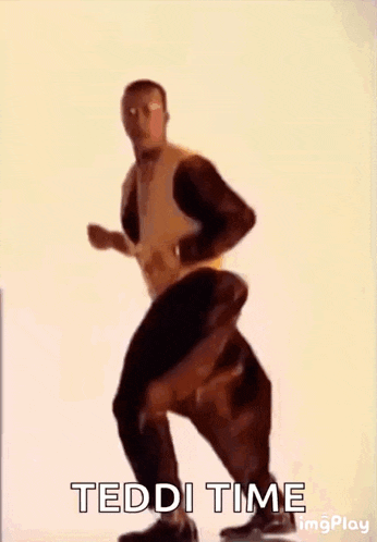 a man in a yellow jacket is dancing with the words teddi time behind him .