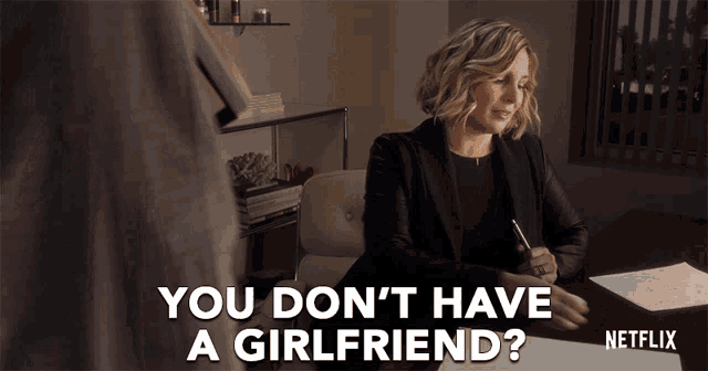 a netflix ad shows a woman sitting at a desk writing