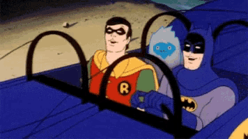 a cartoon of batman and robin driving a car .