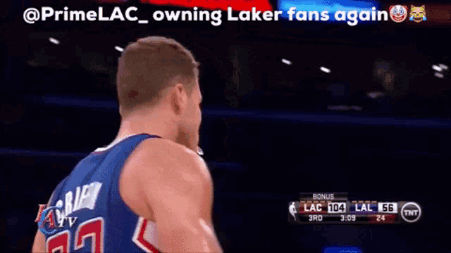 a basketball player with the words " owning laker fans again " written above him