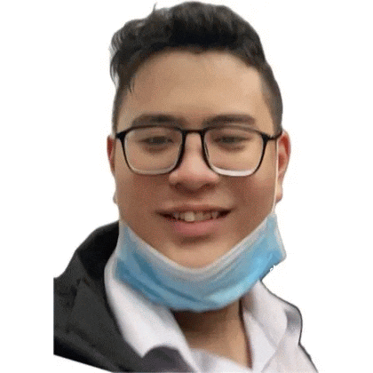 a young man wearing glasses and a blue mask is smiling .