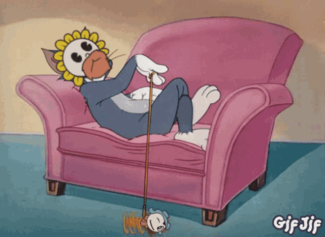 a cartoon of tom and jerry laying on a couch