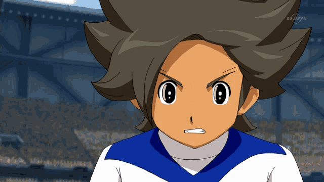 a cartoon of a boy with a serious look on his face is being shown on tv tokyo