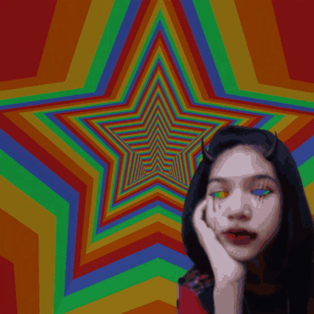 a girl with horns and a rainbow star in the background