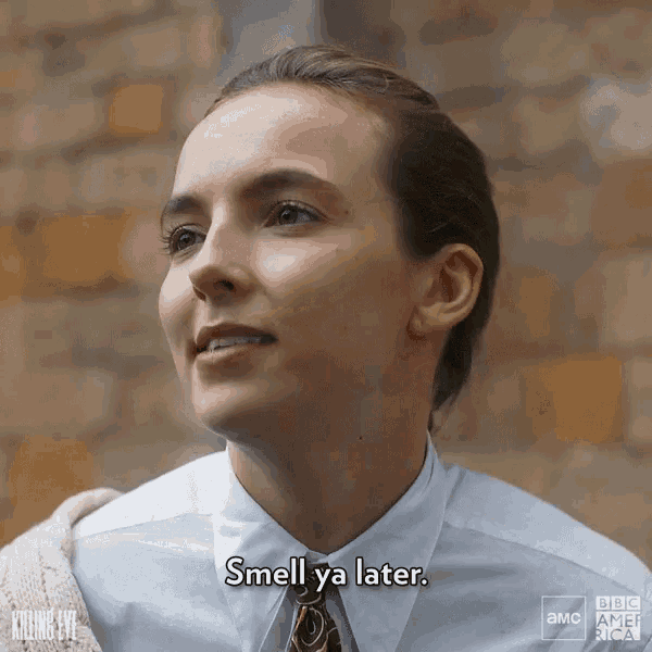 a close up of a woman 's face with the words smell ya later on the bottom