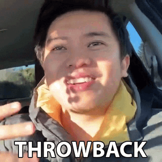 a man sitting in a car with the word throwback written on his face