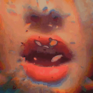 a close up of a person 's mouth with a lot of bubbles in it