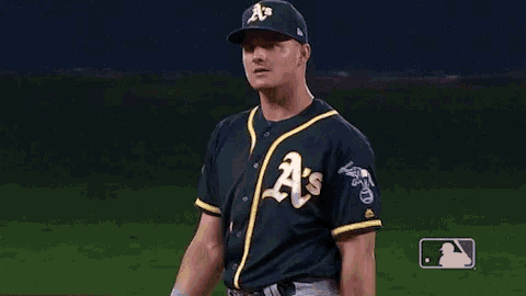 a baseball player wearing a green and yellow jersey with the letter a on it