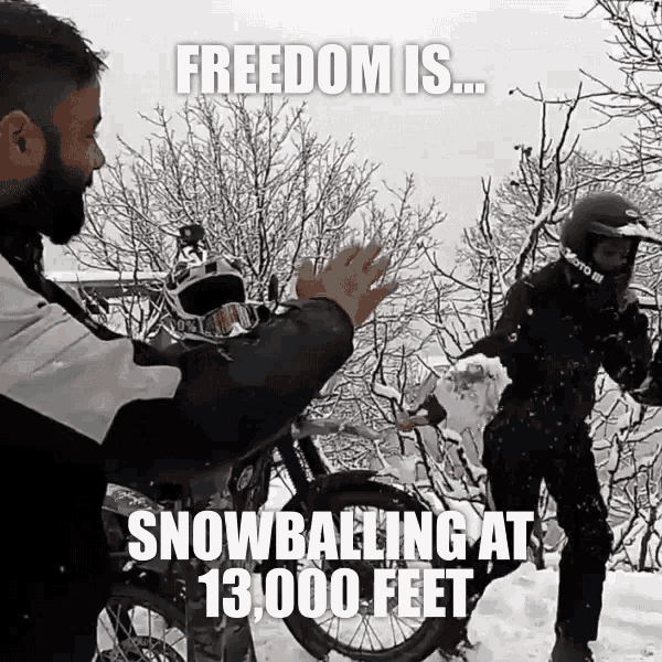 freedom is snowballing at 13,000 feet is written on a poster