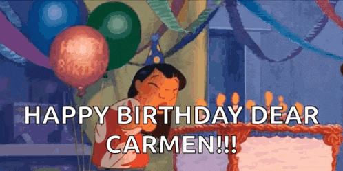 a cartoon character is blowing out candles on a birthday cake and saying `` happy birthday dear carmen ! ''