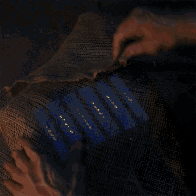 a blurry picture of a person holding a blanket