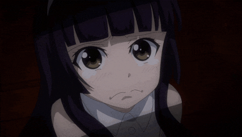 a close up of a girl 's face with tears coming out of her eyes