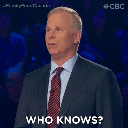 a man in a suit and tie asks " who knows "