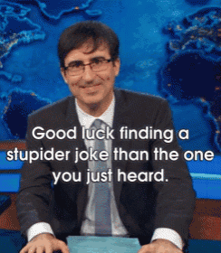 a man in a suit and tie says good luck finding a stupider joke than the one you just heard .