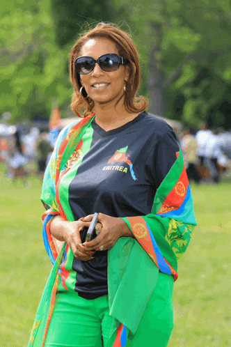 a woman wearing a shirt with eritrea on it