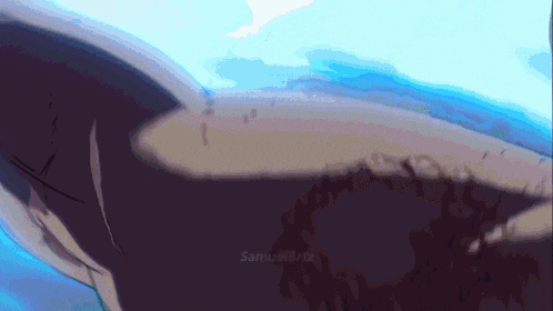 a close up of a person 's arm with samuel written in the lower right corner