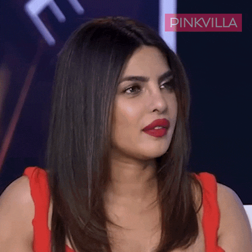 a close up of a woman 's face with the words pinkvilla behind her