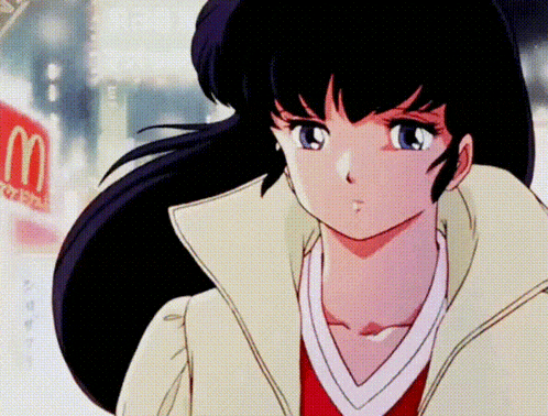 a close up of a girl with a mcdonalds sign in the background