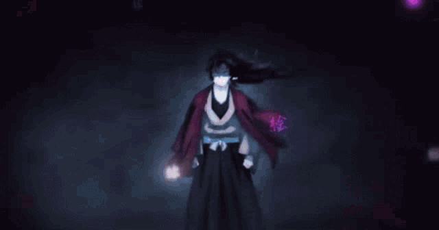 a blurred image of a person standing in a dark room with purple lights .