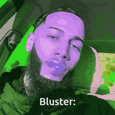 a man with a beard is sitting in a car with a green background and bluster written on the bottom right