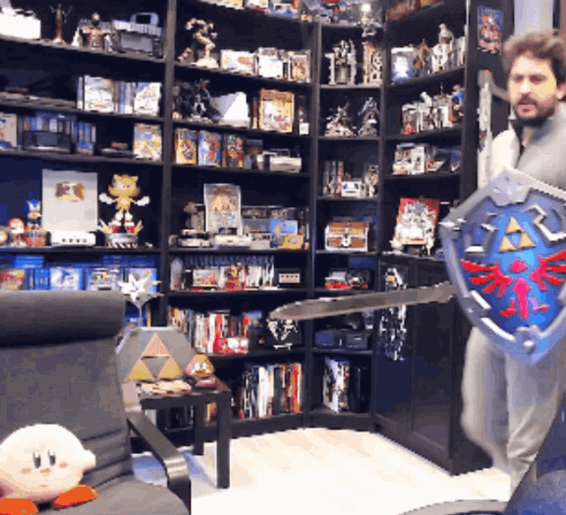 a man is holding a sword and shield in front of a shelf full of books