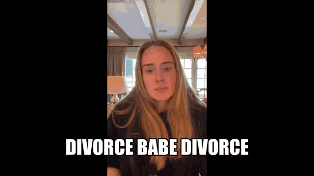 a woman with long blonde hair is standing in a room with the words divorce babe divorce below her