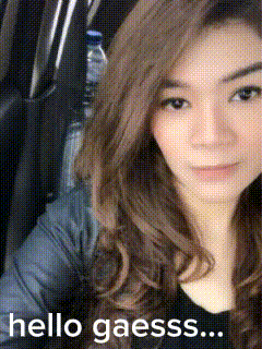 a woman in a car with the words hello gaesss