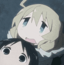 a couple of anime characters are standing next to each other and making funny faces .