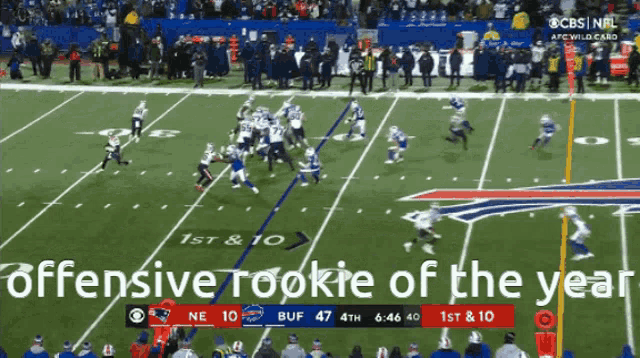 offensive rookie of the year is being displayed on a football field
