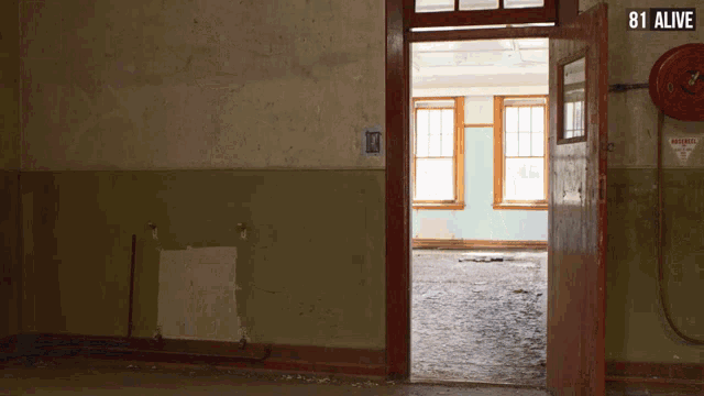 an empty room with the number 81 alive on the top right