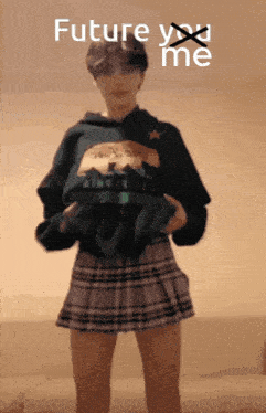 a girl wearing a plaid skirt and a hoodie with the words future you me on the bottom