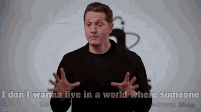 a man in a black shirt says i don t wanna live in a world where someone