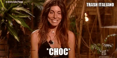 a woman in a black dress is smiling and says choc on the screen
